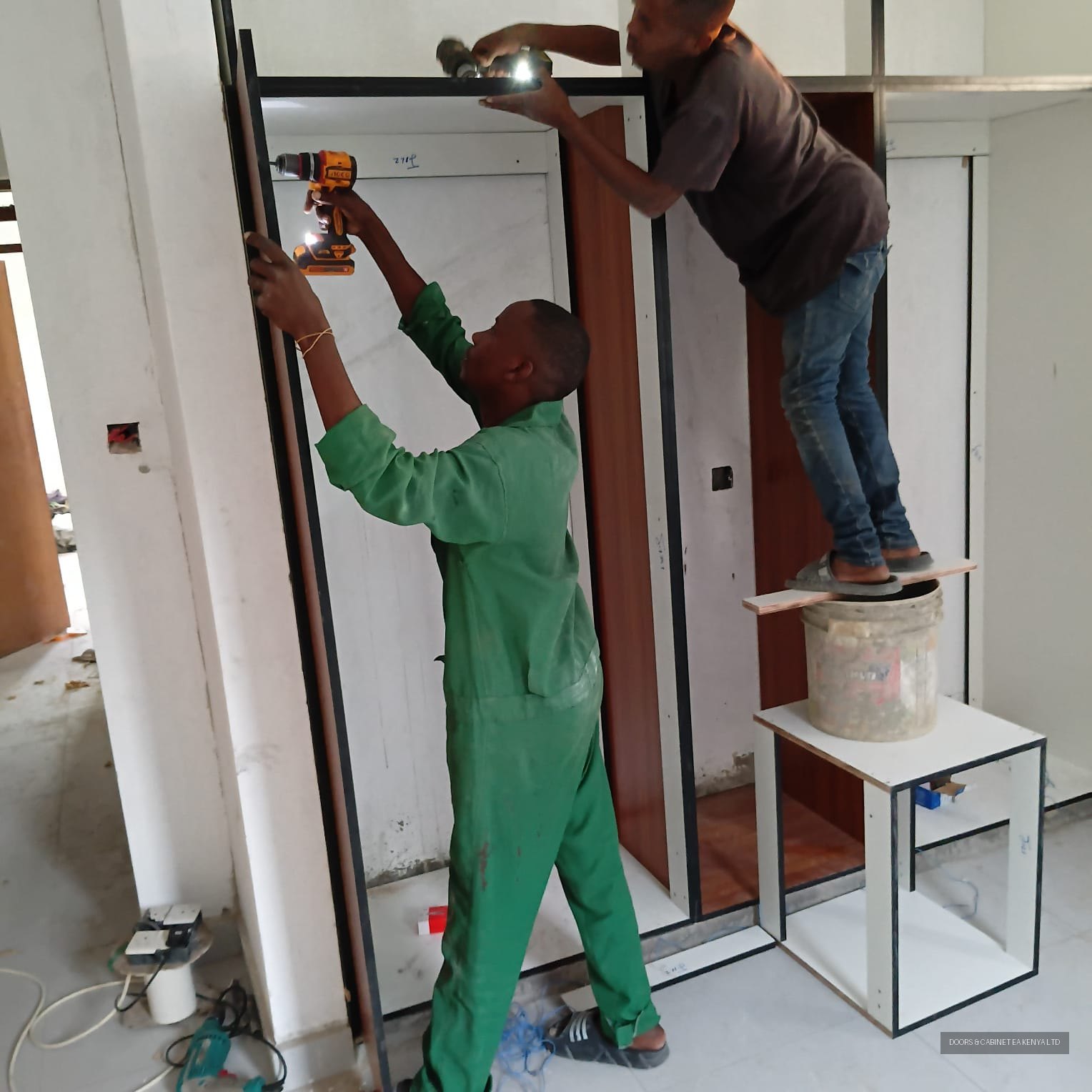 Fitting a Wardrobe On Site — Doors and Cabinet EA fitters in Mombasa